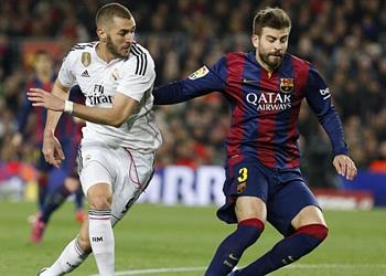 وكيل بنزيما يسخر من بيكيه بعد فوز برشلونة بـ الكلاسيكو على ريال مدريد