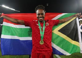 بيرسي تاو يعلن موقفه من الرحيل عن الأهلي ودور كولر في تألقه