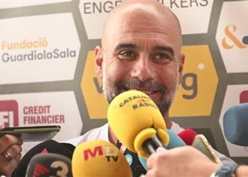 جوارديولا يرد على اتهامه بالتسبب في رحيل تشافي عن برشلونة