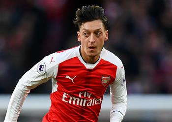 بيكهام يخطط لنقل أوزيل إلى الدوري الأمريكي