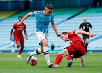 مايكل أوين ينتقد روبرتسون بعد سقوط ليفربول أمام مانشستر سيتي