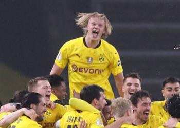 بوروسيا دورتموند يعلق بسخرية على غياب هالاند عن التدريبات