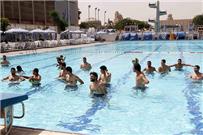 الأهلي يتدرب في حمام السباحة