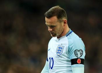 رسمي ا روني يعتزل اللعب الدولي