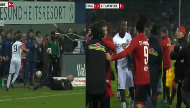 حدث في الدوري الالماني لاعب فرانكفورت يدفع مدرب فرايبورج ويسقطة ارضا وخناقة بين اللاعبيين